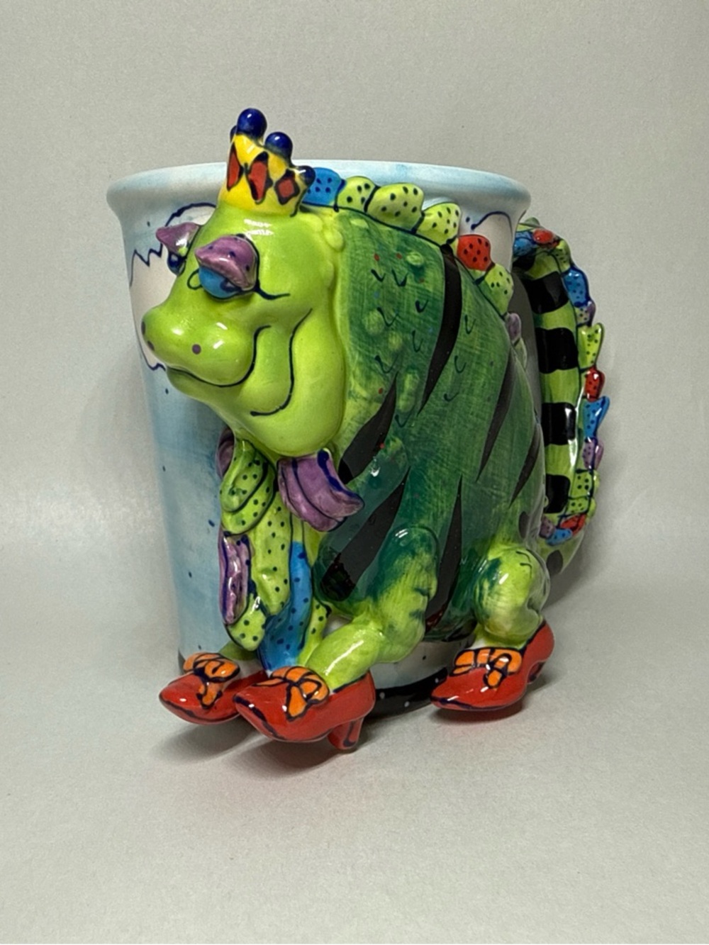 Whimsical Green Dragon Ceramic Mug with Colorful Accents